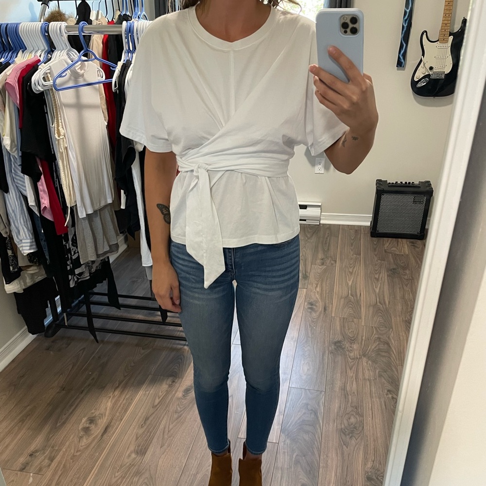 Soft white tee with wrap around tie at waist. From Banana Republic.